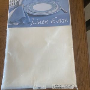 New 70” round Linen Ease tablecloth, cream.